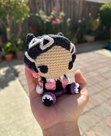 crocheted doll of Clove from video game Valorant