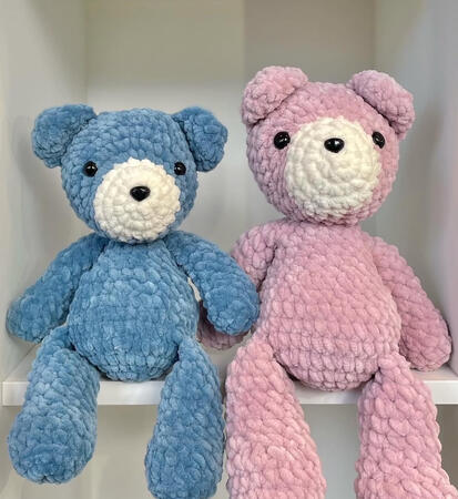 crocheted teddy bears in pastel blue and pink